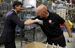 Worcester, England. The chncellor, Rishi Sunak, left, greets an employee during a visit to a Bosch factory to promote the ‘plan for jobs’ initiative