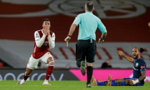 Gabriel reacts with horror as he sees the referee Paul Tierney prepare to show the Arsenal player’s second yellow card, for a foul on Theo Walcott