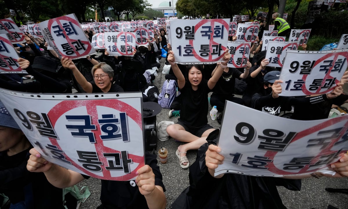 South Korea passes law to protect rights of teachers after mass protests over abuse from parents | South Korea | The Guardian