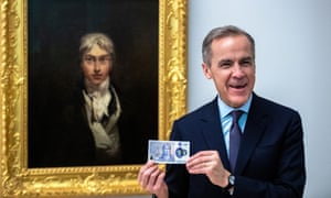 Mark Carney, governor of the Bank of England, poses for photographs with the new twenty pound note in front of J.M.W. Turner’s self-portrait from 1799 at Tate Britain.