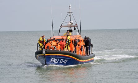 People on a lifeboat off the coast of Kent.