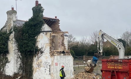 A third image posted on Instagram by Banksy shows the demolition of the building, with the mural destroyed.