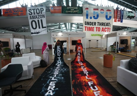 Climate COP30Activists hang banners while participating in a demonstration at the Cop30 UN Climate Summit, Friday, Nov. 21, 2025, in Belem, Brazil. (AP Photo/Andre Penner)
