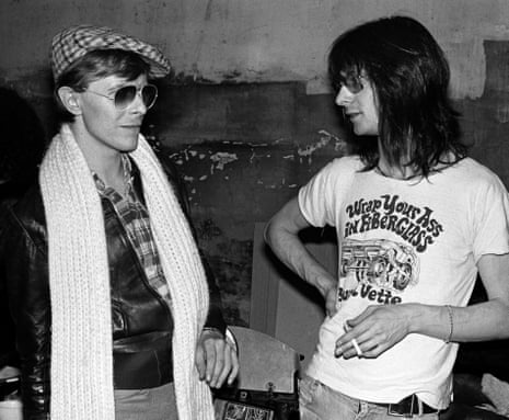 Starmen … David Bowie (left) with Lenny Kaye from the Patti Smith Group in 1975.