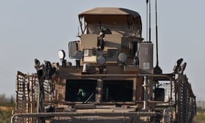 US soldiers on the road leading to Manbij, Syria