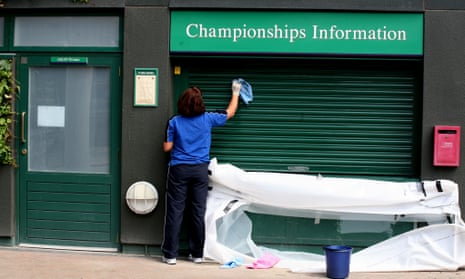 A cleaner at work, at the All England Lawn Tennis Club in Wimbledon.