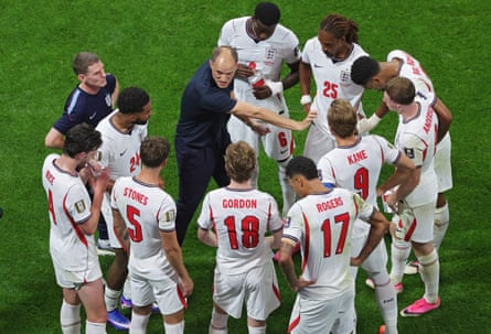England’s head coach Thomas Tuchel talks to players during the first hydration break