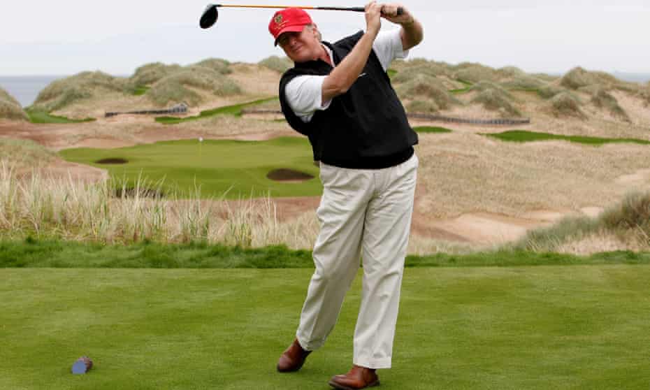 Donald Trump practices his swing at the Trump International Golf Links course near Aberdeen.