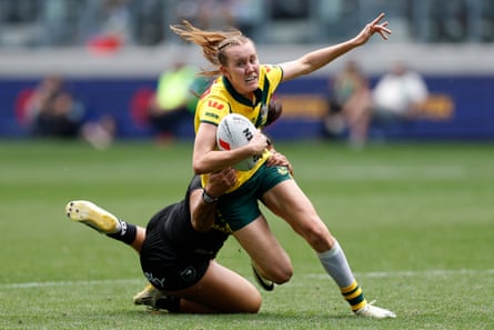 Tamika Upton is tackled by a New Zealand player