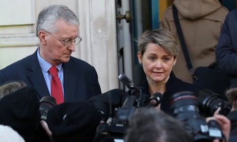Hilary Benn and Yvette Cooper talking to the media as they leave the Cabinet Office.