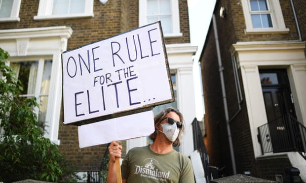 A protester outside the London home of Dominic Cummings last week.