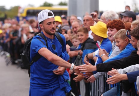 Jack Harrison is greeted by the fans.
