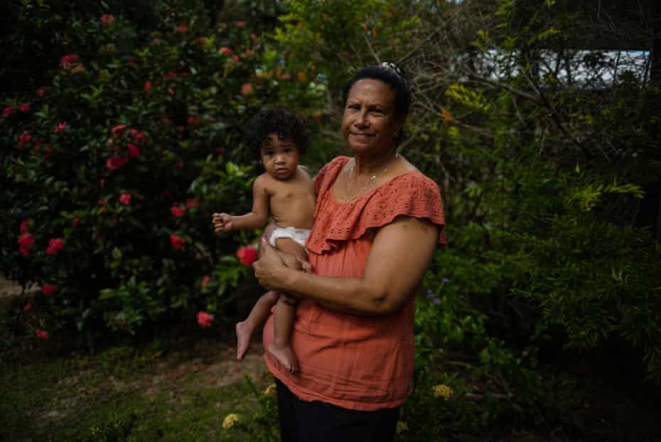 Charlotte Nona, with her granddaughter Sunny, 9 months, at her home on Badu Island. Charlotte is the Director of Primary Health Care in Torres Strait.