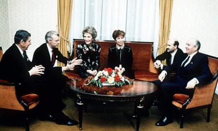 In November 1985, Ronald Reagan, his wife Nancy and an aide, left, meet Mikhail Gorbachev, his wife Raisa and an aide in Geneva, Switzerland.