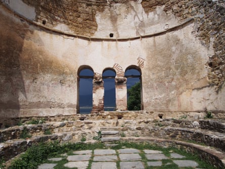 Three arched windows inside the basilica of Agios Achilleios