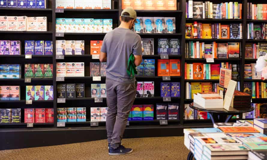 a man
browses the shelves at Waterstones
