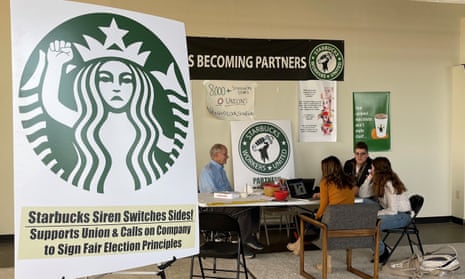 Richard Bensinger, left, and baristas discuss their efforts to unionize three Buffalo-area stores at the movement’s headquarters in Buffalo, New York.
