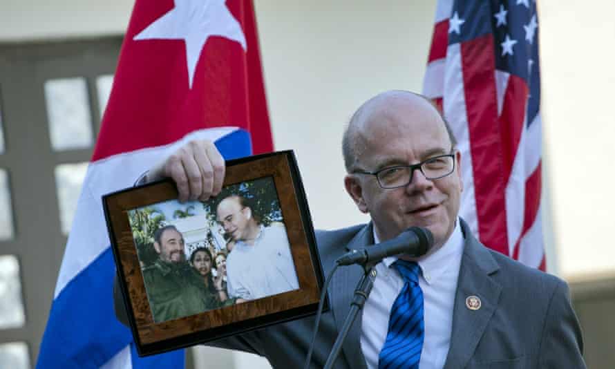 US congressman Jim McGovern holds up a framed picture of himself and Fidel Castro, at the inauguration of the conservation centre in Havana