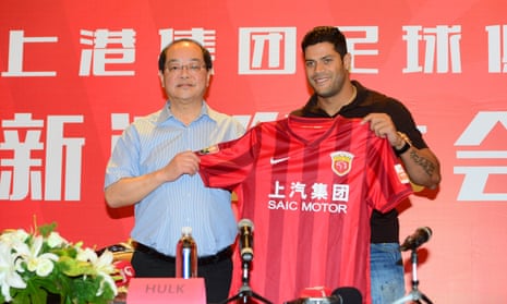 Brazilian forward Hulk poses after signing for Shanghai SIPG