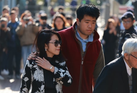 Jimmy Lai’s wife Teresa Lai and son Lai Shun Yan arriving at the courts building