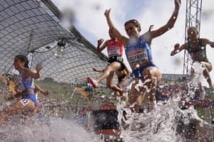 Monta Laura Dalla, of Italy, centre, competes in a Women’s 3,000m steeplechase heat during the athletics competition in the Olympic Stadium in Munich at the European Championships