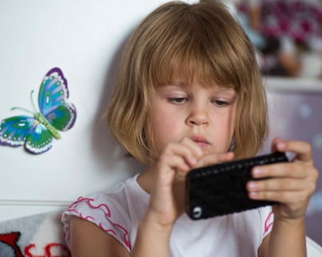 Girl playing on mobile phone