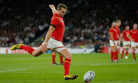 Dan Biggar kicks one his seven penalties during Wales’s 28-25 victory over England at Twickenham.
