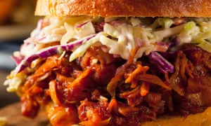 Vegan pulled jackfruit BBQ sandwich with coleslaw and chips