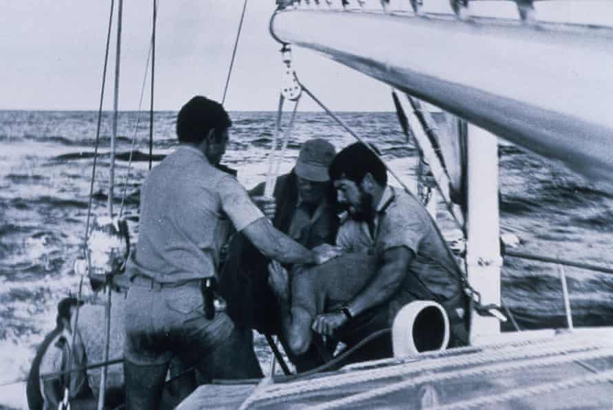 A sequence of images of French police boarding the VEGA and beating up McTaggart. In August 1973, the Vega sails into the zone the French government has declared a prohibited area. On 15 August the yacht is boarded by a French navy commando. Nigel Ingram and David McTaggart are beaten up and injured. Ann-Marie Horne manages to take pictures of the attack and smuggle them off the ship