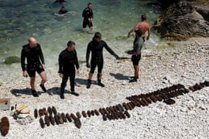 Vlora, Albania. French divers from the minelaying cruiser Pluton retrieve ammunition during a joint operation with Albanian divers to clean the bed of the Adriatic Sea of second world war ammunitions