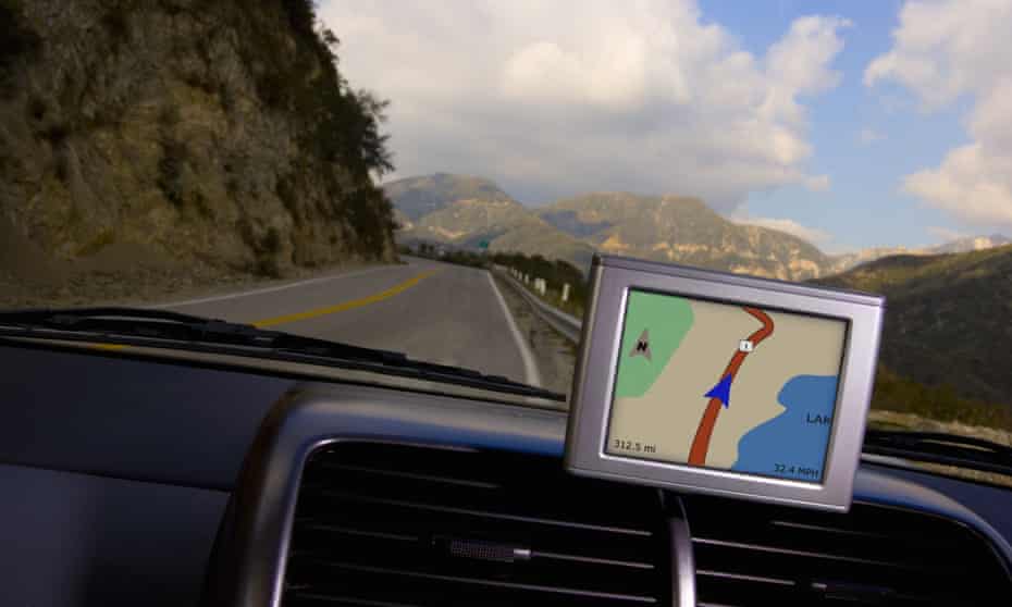 Satnav screen in car on mountain road