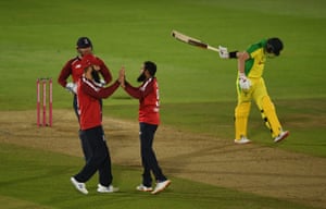 Rashid celebrates after taking the wicket of Smith.