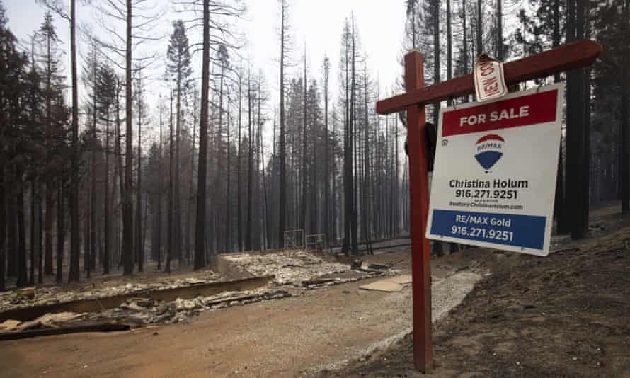 A burned down house is seen in Grizzly Flats.