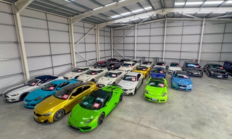 High-value cars in a hangar