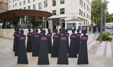 A protest by Refuge outside New Scotland Yard, October 2021.