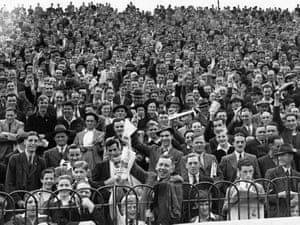 Fans watch Chelsea play Bolton in London.