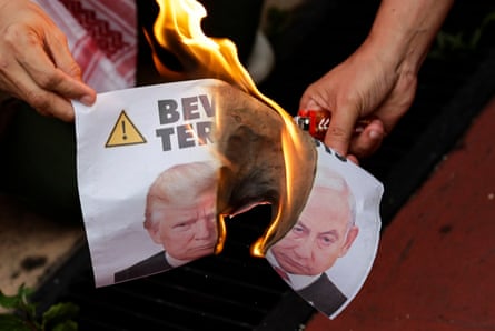 Pictures of Trump and Netanyahu engulfed in flames