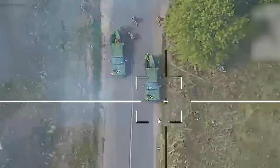 Drone view looking down on two Ukrainian army mobile missile launchers