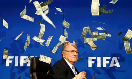 Sepp Blatter of Fifa is showered with Brodkin’s fake cash.