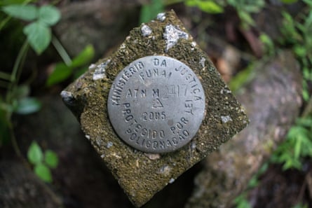 A Funai marker shows a boundary of Indigenous territory in Rondônia state, Brazil.