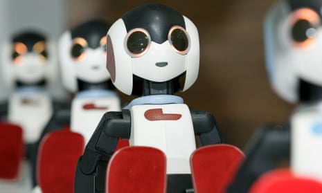 Robi robots on display in Tokyo. They may look cute, but increasingly they are taking our jobs. 