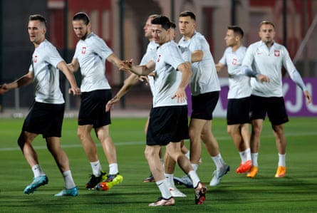 Robert Lewandowski (centre) and his Poland teammates take part in a training session on Friday.