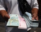 Iran’s rial falls to record low as Scott Bessent warns of ‘economic D-day’ – business live