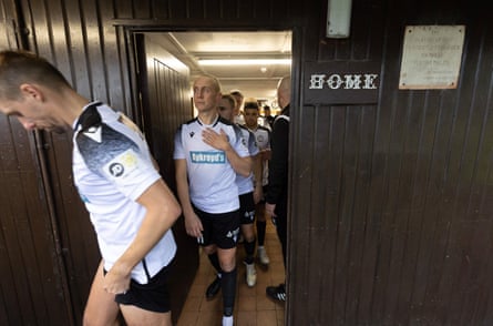 Bala Town players come out of the home changing room for the start of their fixture against Pen-y-bont in the Cymru Premier League on the 3G pitch at the Maes Tegid ground in Bala.