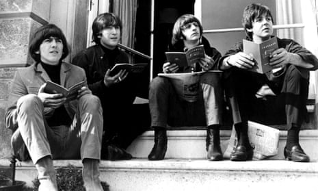 the Beatles catch up with some reading during a break in the filming of Help! in 1965.