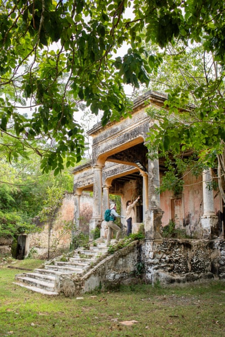 Hikers explore the ruins of the Tzacalá hacienda in southern Mérida