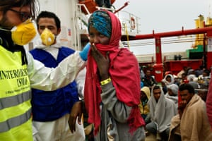 Eritrean refugees arrive in Sicily last November after being rescued from a smugglersâ boat off the coast of Libya