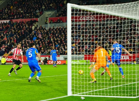 Jordan Henderson scores the opening goal for Brentford against Leeds