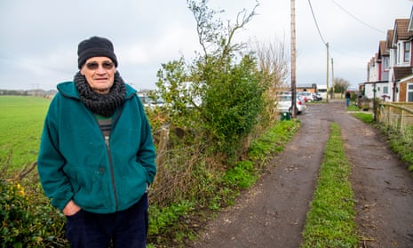 Local resident Mick Palmer in front of the site of the proposed lorry park.