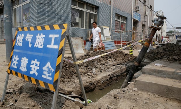 A gas pipeline construction on the outskirts of Beijing. There is a demand-supply gap for gas after coal stoves have been demolished. 